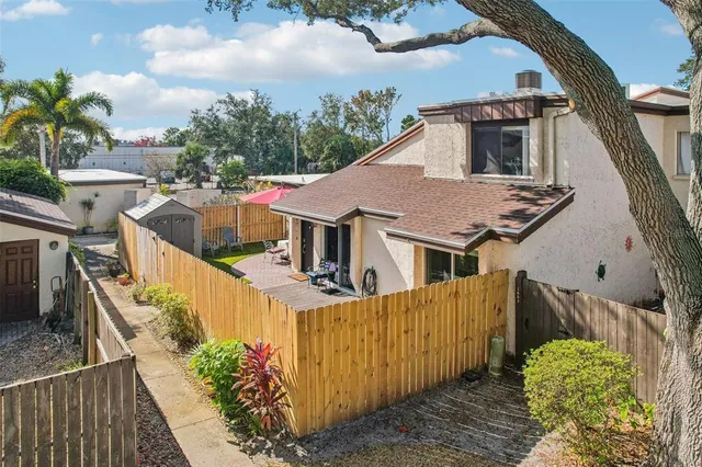 a aerial view of a house with a yard