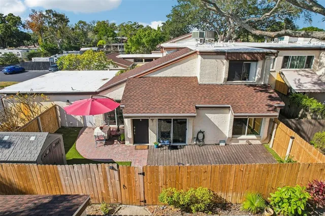 aerial view of a house with a patio