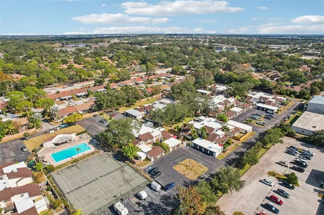 an aerial view of residential building with parking space