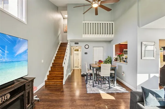 a view of an entryway with wooden floor