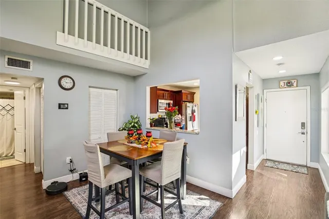 a view of a livingroom with furniture and wooden floor