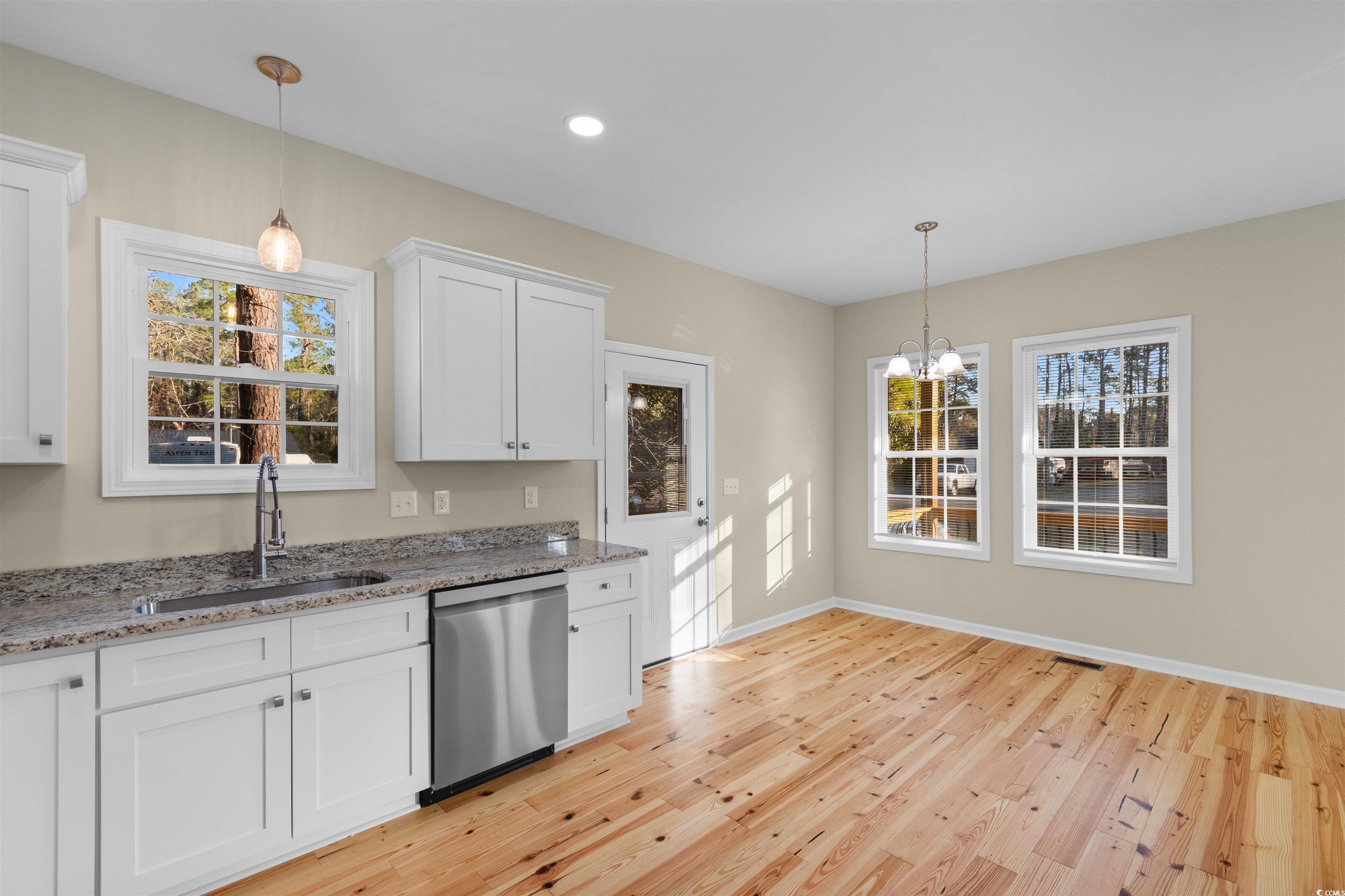 135 Oak Log Lake Road Conway, SC 29526 - Photo 6 of 35 Kitchen with light wood finished floors, dishwashe