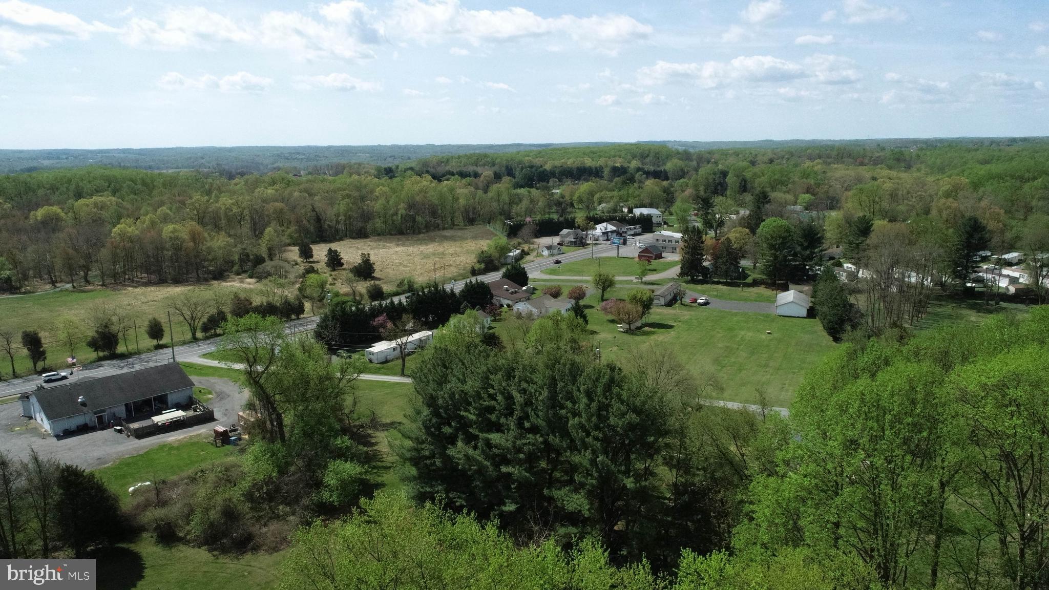 3118 Old Scarboro Road Street, MD 21154 - Photo 18 of 18 a view of a lake with residential houses with outdoor space and trees