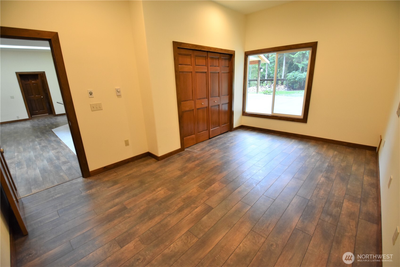 30331 Heimer Road Arlington, WA 98223 - Photo 7 of 37 a view of a livingroom with wooden floor and window