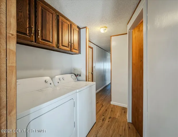 a utility room with cabinets