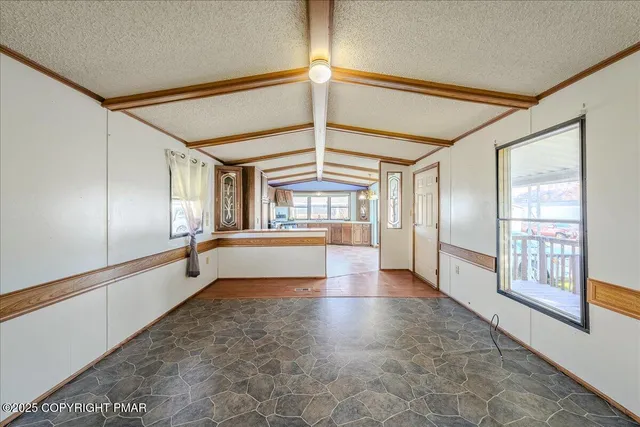 a view of an entryway with front door