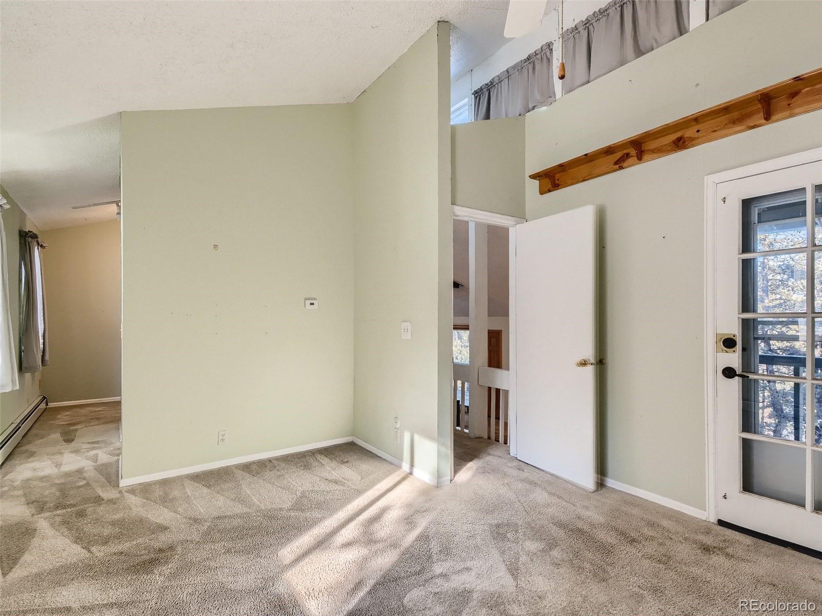 20 Long Ridge Drive Bailey, CO 80421 - Photo 20 of 25 a view of a big room with closet and windows