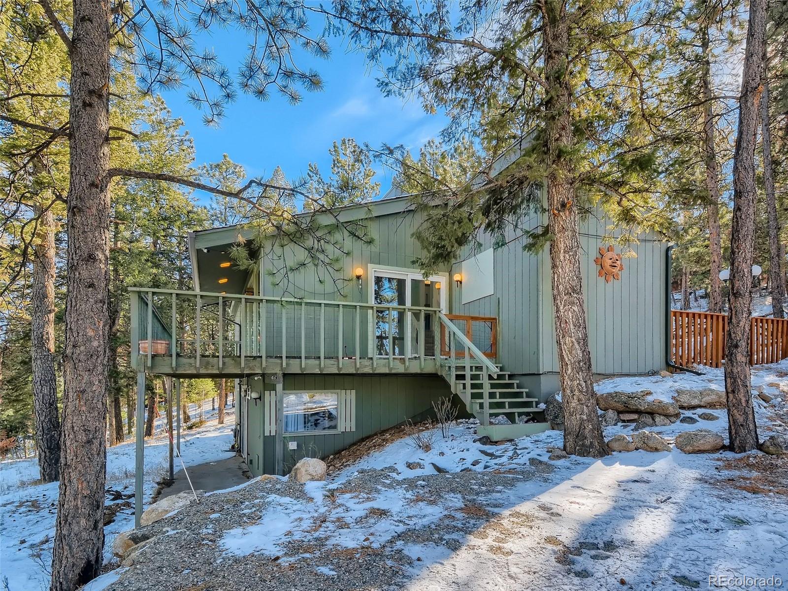20 Long Ridge Drive Bailey, CO 80421 - Photo 2 of 25 a view of a house with a balcony