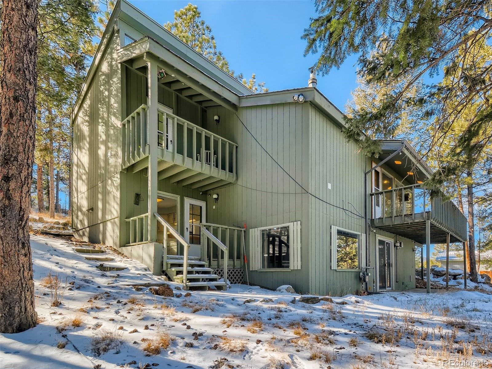 20 Long Ridge Drive Bailey, CO 80421 - Photo 5 of 25 a front view of a building