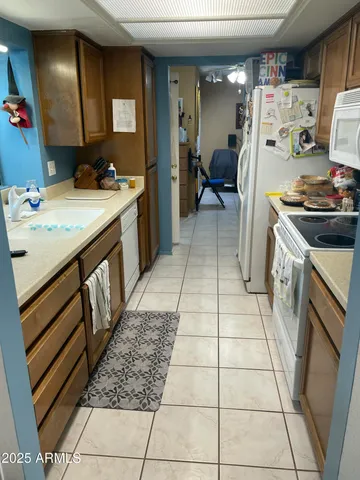 a bedroom with a bed and a table