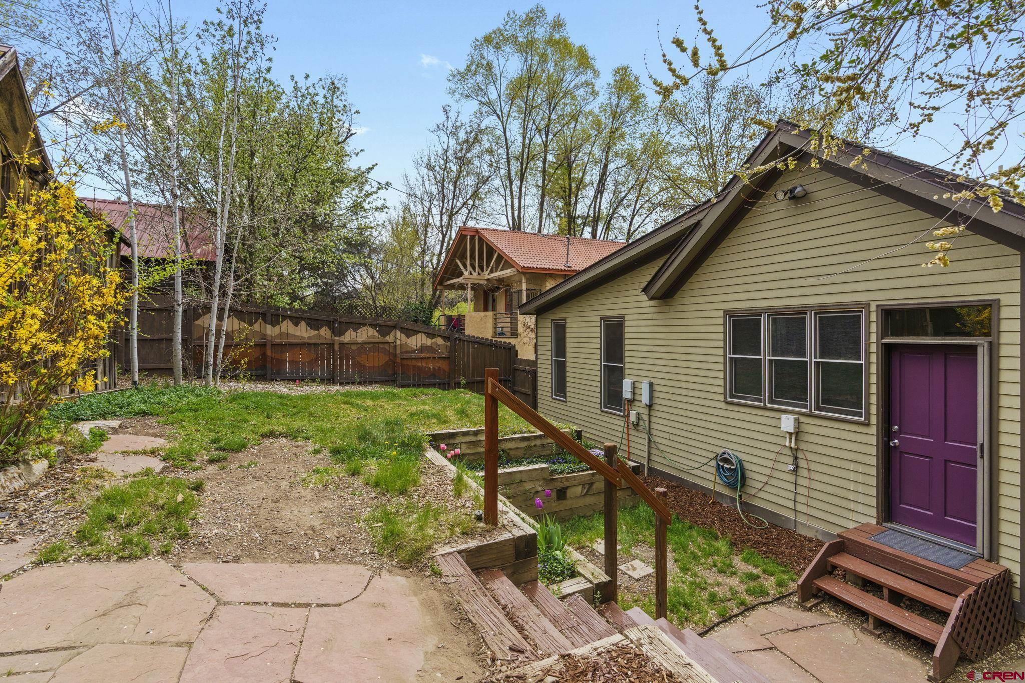 1330 East 3rd Avenue Durango, CO 81301 - Photo 29 of 32 a view of a house with backyard and sitting area