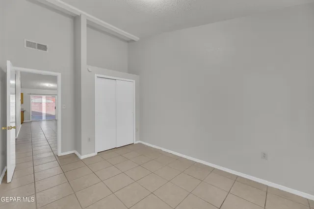 a bathroom with a toilet and a bath tub