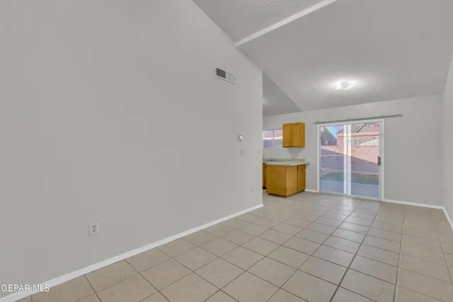 a view of an empty room and entrance