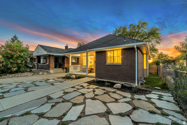 Undisclosed Address Ogden, UT 84403 - Photo 2 of 21 View of front facade with brick siding and covered porch