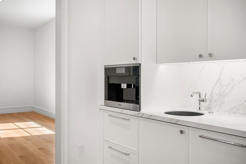 78 Arnold Road Wellesley, MA 02481 - Photo 11 of 42 a bathroom with a sink and a mirror