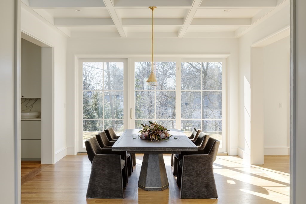 78 Arnold Road Wellesley, MA 02481 - Photo 14 of 42 a view of a dining room with furniture window and wooden floor