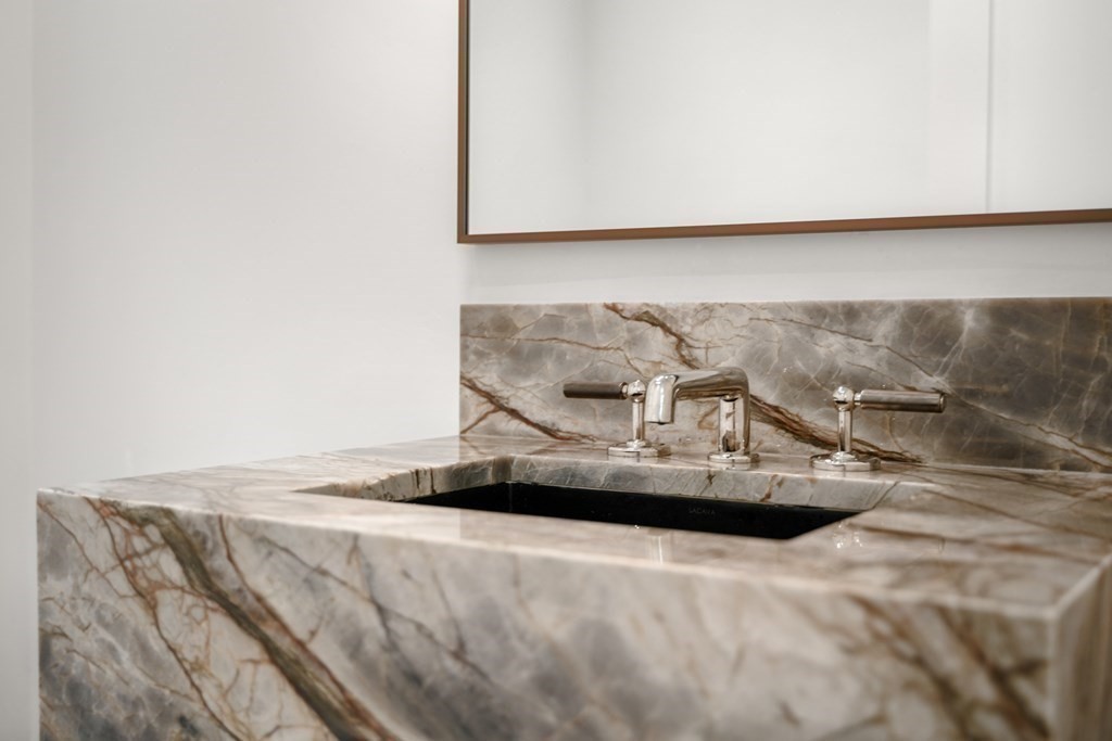 78 Arnold Road Wellesley, MA 02481 - Photo 18 of 42 a view of a car in a bed