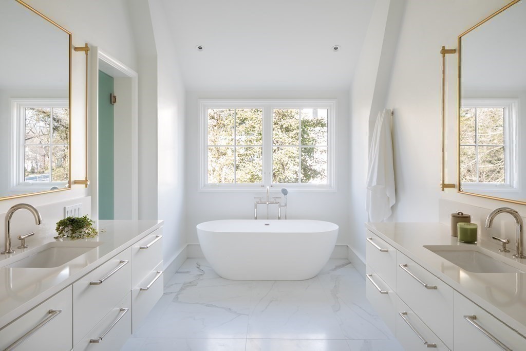 78 Arnold Road Wellesley, MA 02481 - Photo 24 of 42 a spacious bathroom with a double vanity sink a mirror and a bathtub