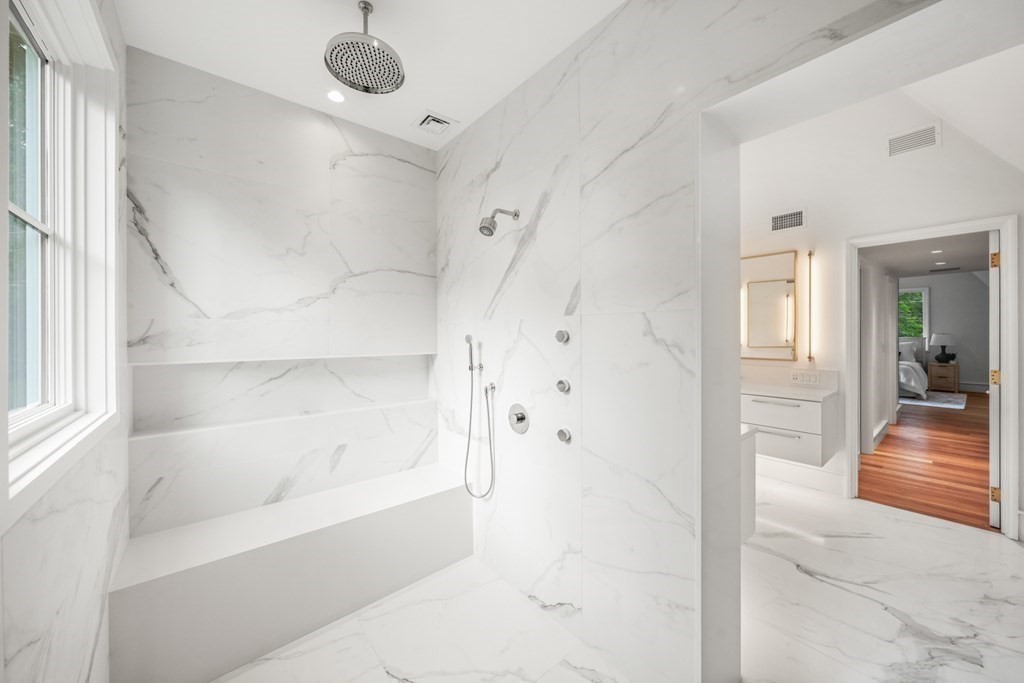 78 Arnold Road Wellesley, MA 02481 - Photo 25 of 42 a bathroom with a bathtub and shower