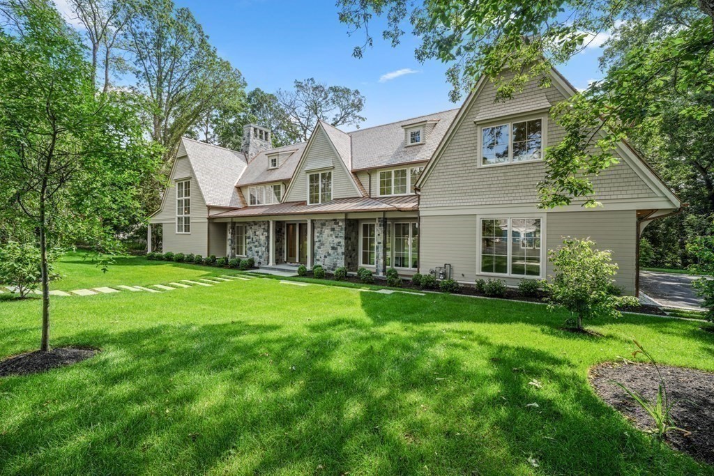 78 Arnold Road Wellesley, MA 02481 - Photo 39 of 42 a front view of a house with a yard