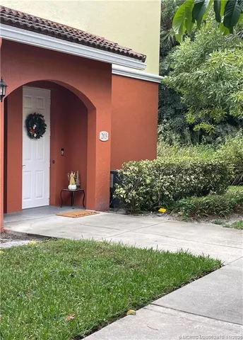 a view of a backyard of the house
