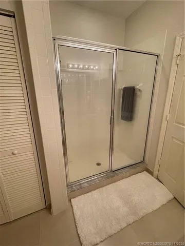 a kitchen with a stove a sink and a refrigerator