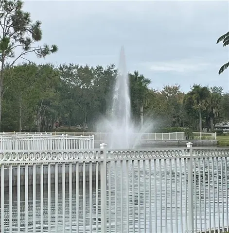 a view of a bench in a yard next to a yard