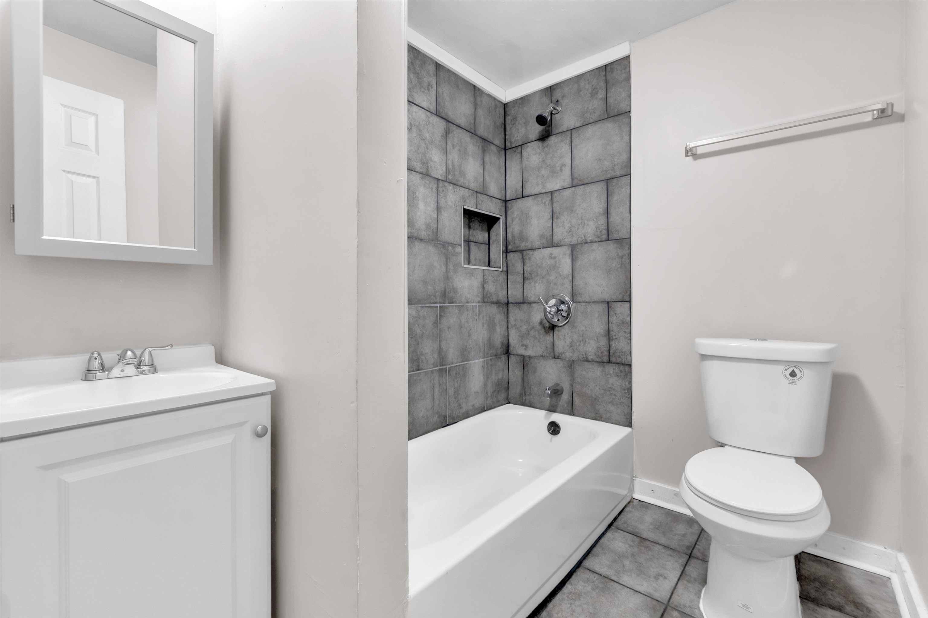 689 Baltimore Street Memphis, TN 38114 - Photo 11 of 14 a bathroom with a sink a toilet and shower