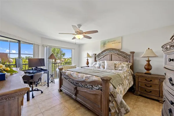 a bedroom with a bed and furniture