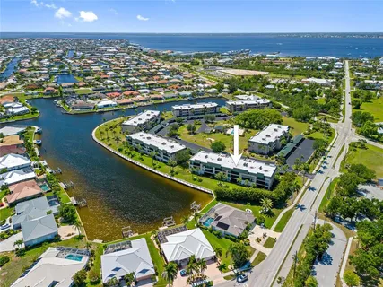 a view of a city with an ocean