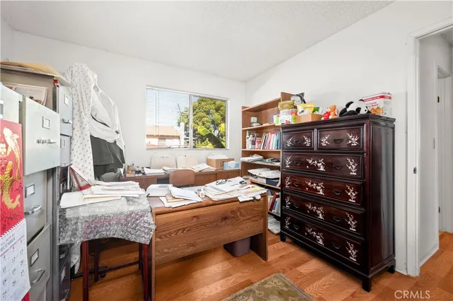 a bed room with a bed and a furniture