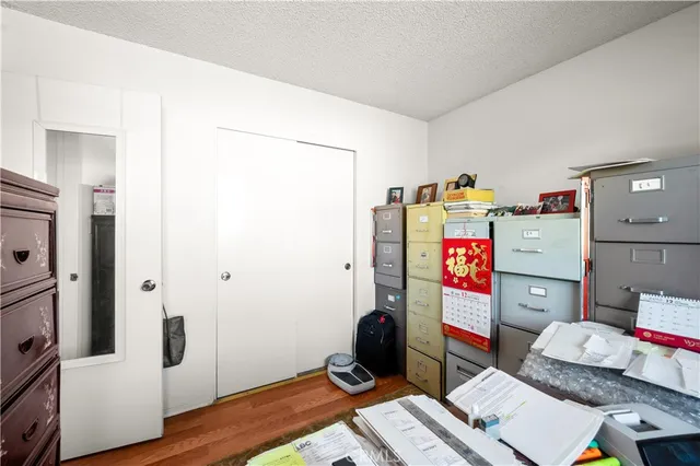 a room with furniture and a wooden floor