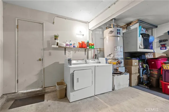 a storage room with washer and dryer