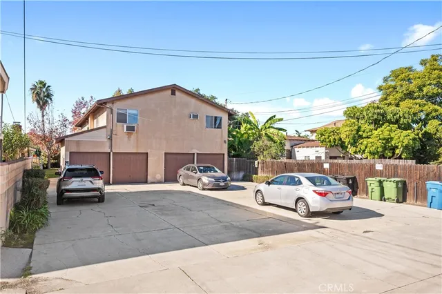 a view of a car parked in front of a building