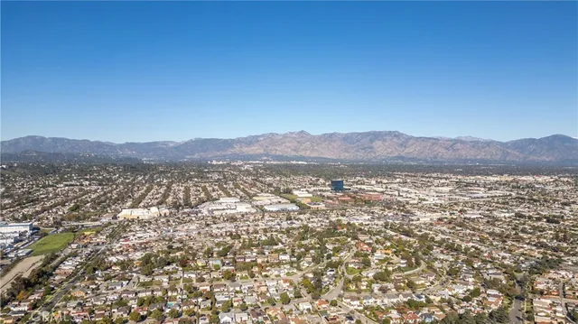an aerial view of a residential apartment building in a city