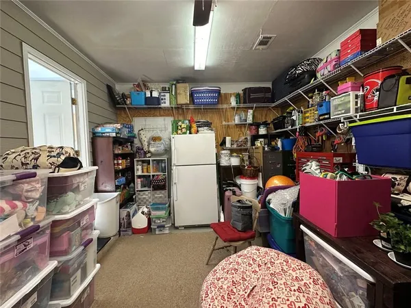 a storage room with washer and dryer