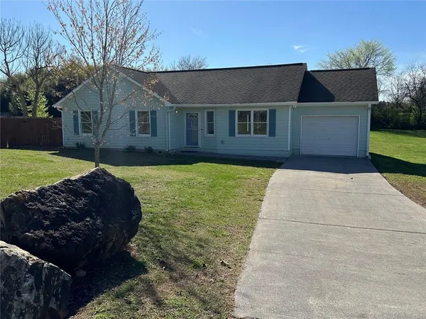 a house view with a garden space