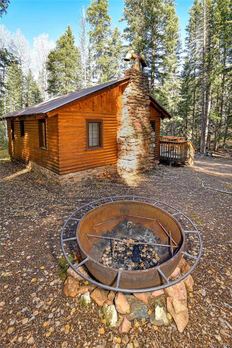 104 Usfs Divide, Unit 383 Divide, CO 80814 - Photo 2 of 41 a view of a house with a small yard