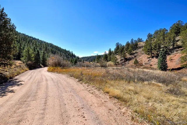 a view of mountain view with mountains in the background