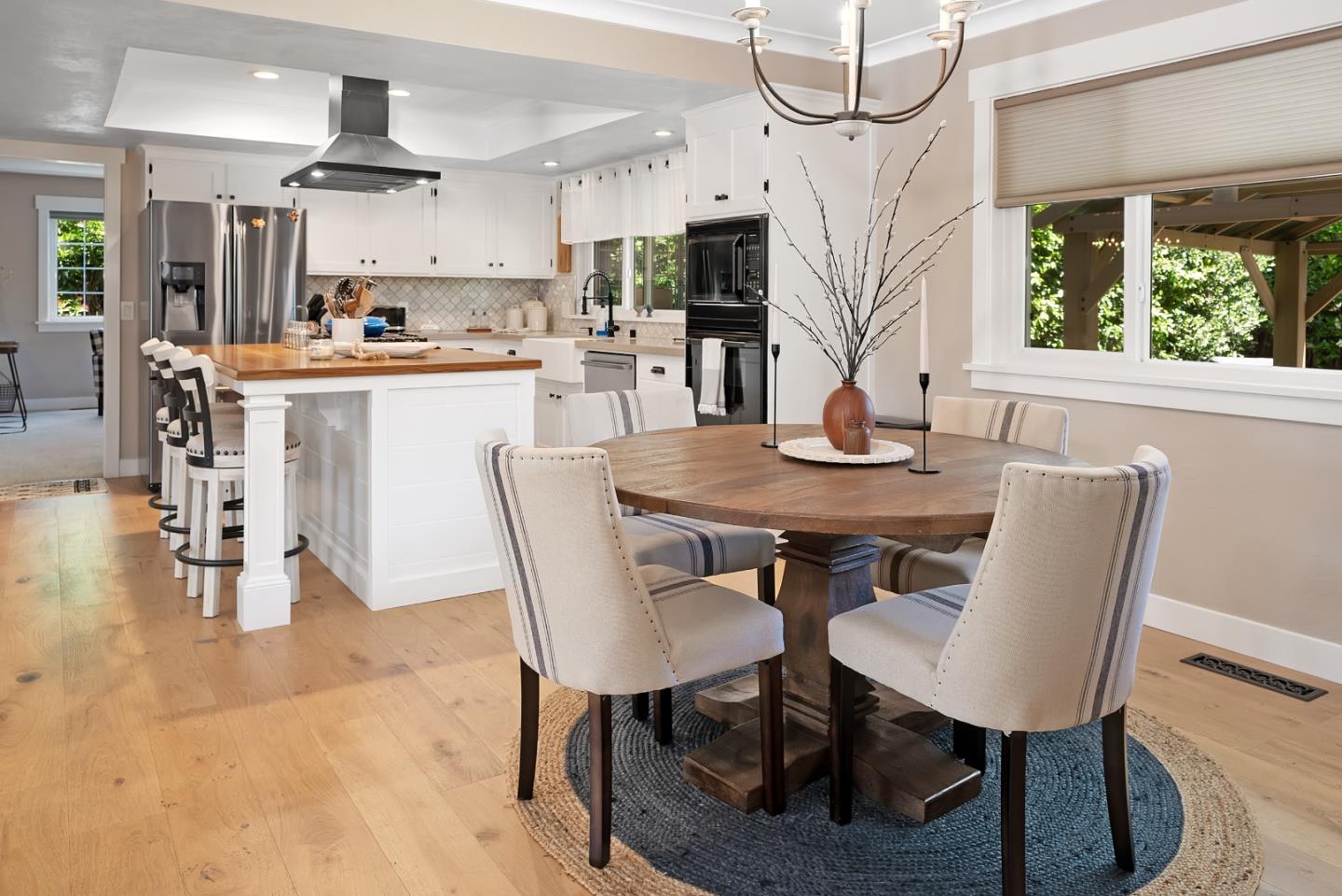 105 Rays Circle Hollister, CA 95023 - Photo 12 of 36 a view of a dining room with furniture window and wooden floor