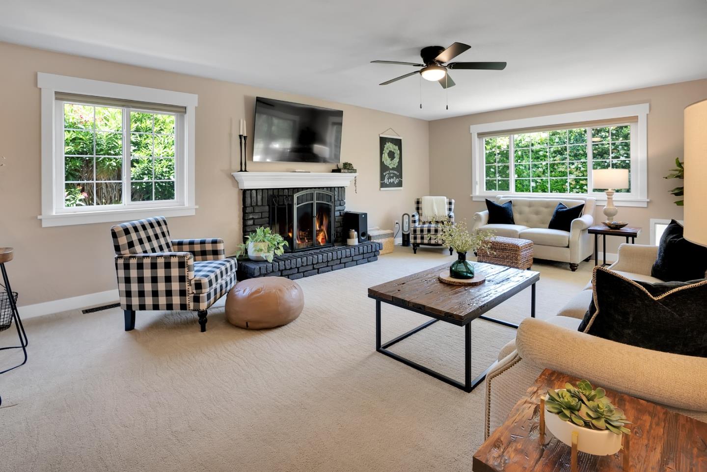 105 Rays Circle Hollister, CA 95023 - Photo 13 of 36 a living room with furniture and a fireplace