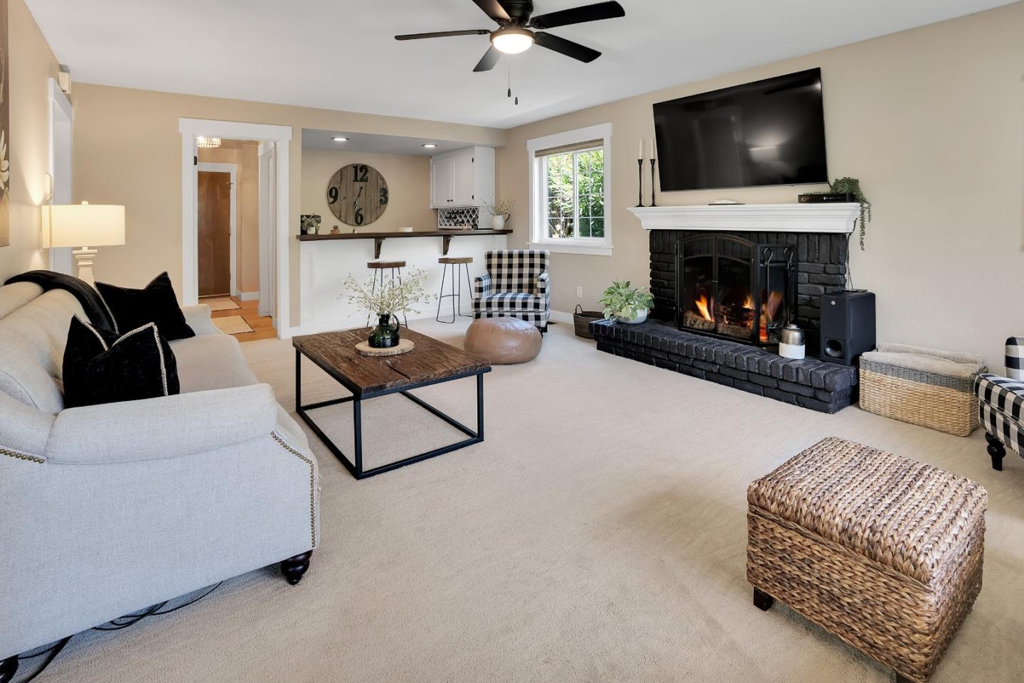 105 Rays Circle Hollister, CA 95023 - Photo 14 of 36 a living room with furniture and a fireplace