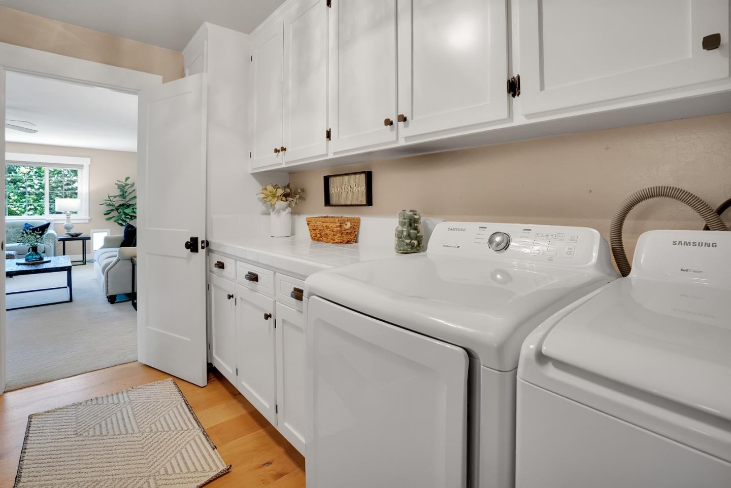 105 Rays Circle Hollister, CA 95023 - Photo 18 of 36 a utility room with dryer and washer