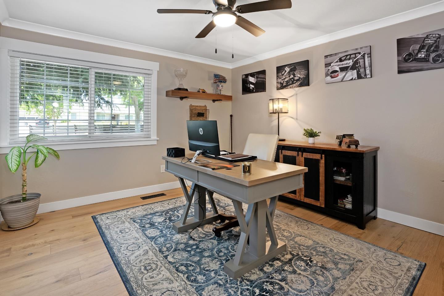 105 Rays Circle Hollister, CA 95023 - Photo 24 of 36 a view of a workspace with furniture and a window