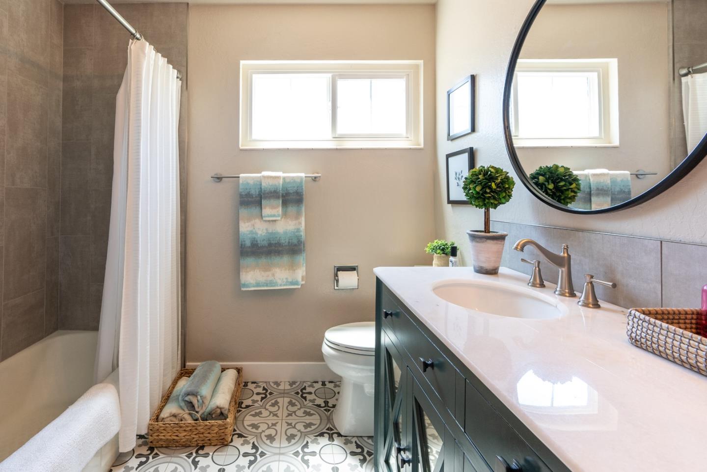 105 Rays Circle Hollister, CA 95023 - Photo 28 of 36 a bathroom with a sink and a mirror