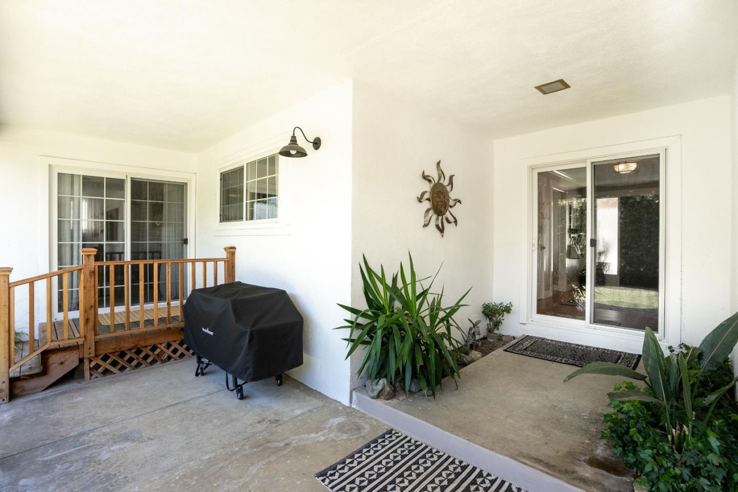 105 Rays Circle Hollister, CA 95023 - Photo 29 of 36 a backyard of a house with wooden floor and outdoor seating