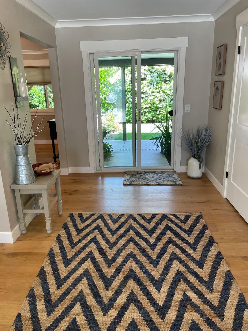 105 Rays Circle Hollister, CA 95023 - Photo 3 of 36 a living room with patio furniture and a wooden floor