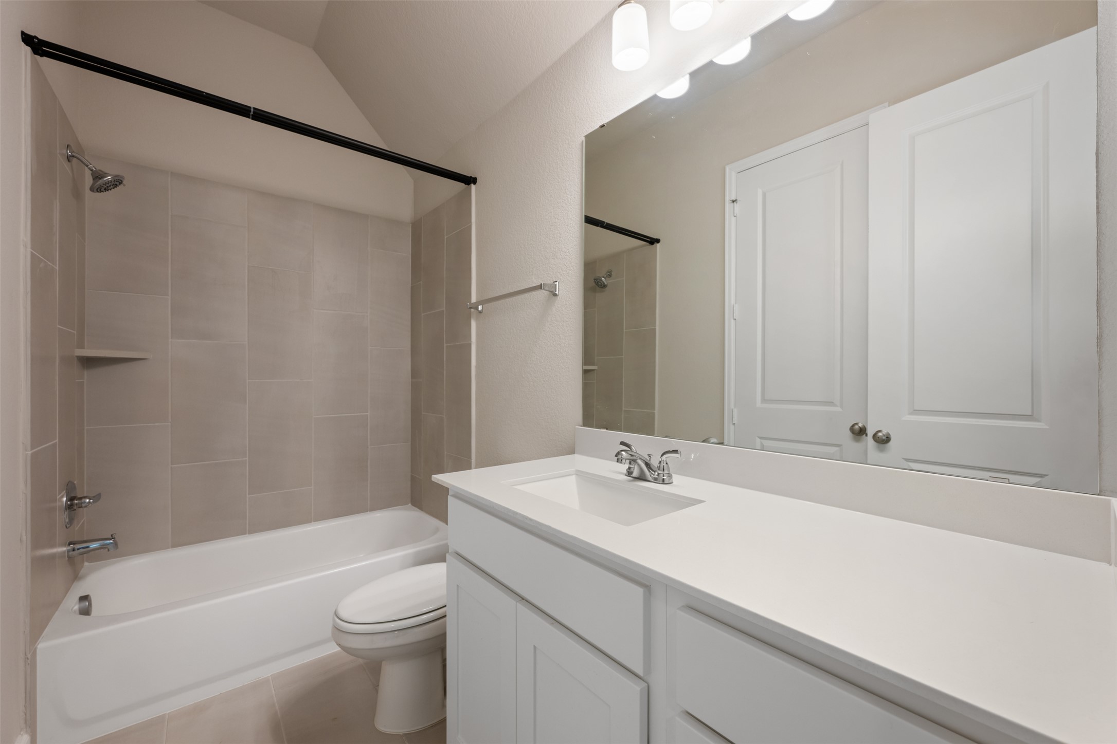 104 Anejo Bluff Georgetown, TX 78628 - Photo 12 of 40 a bathroom with a sink a toilet and shower