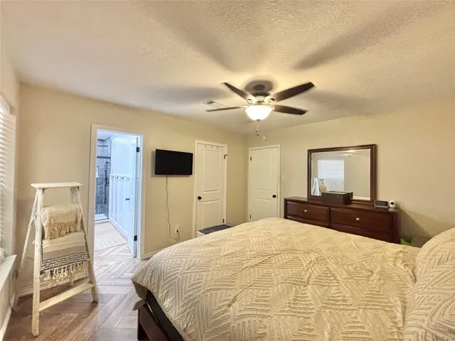 a bathroom with a double vanity sink mirror and toilet