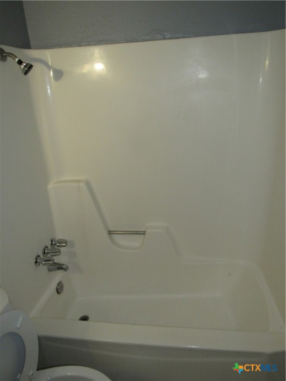 1301 Quail Circle, Unit D Killeen, TX 76549 - Photo 11 of 11 a bathroom with a bathtub